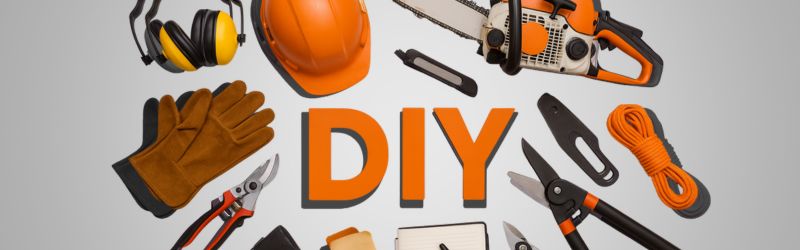 DIY tools and safety gear including chainsaw, gloves, helmet, rope, and pruning shears for home projects.